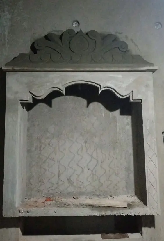 Design Of A Home's Cement Mandir