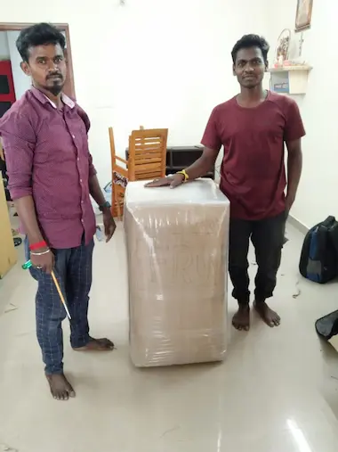 Man Packing Household item For Shifting